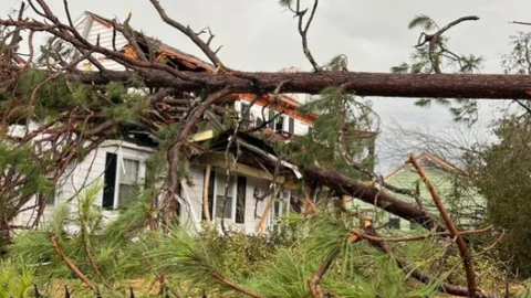 Residents begin to pick up the pieces after tornadoes ravage the Southeast