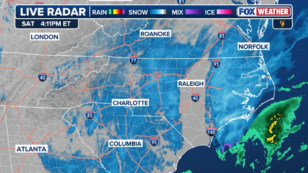 Coastal storm clobbers the Carolinas, record snow reported in Charlotte