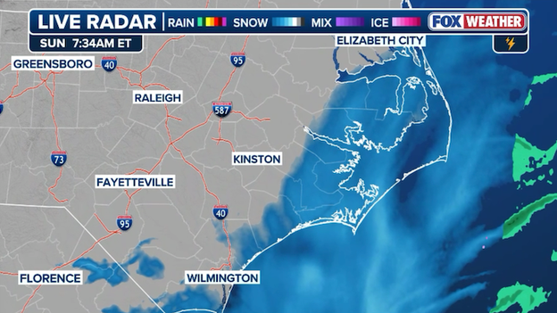 Final flakes flying on North Carolina's Outer Banks as nor'easter moves away