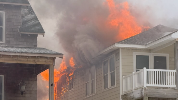 Firefighters battle massive house fire as nor'easter winds rage in Nags Head, North Carolina