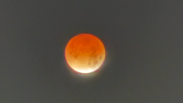 Arkansas skywatchers dodge clouds for totality this morning