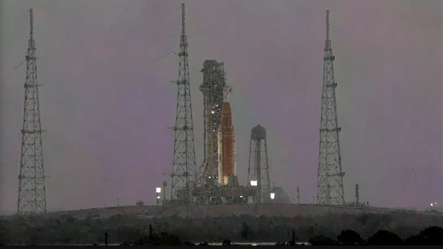 Sun rises over Artemis II rocket at Kennedy Space Center