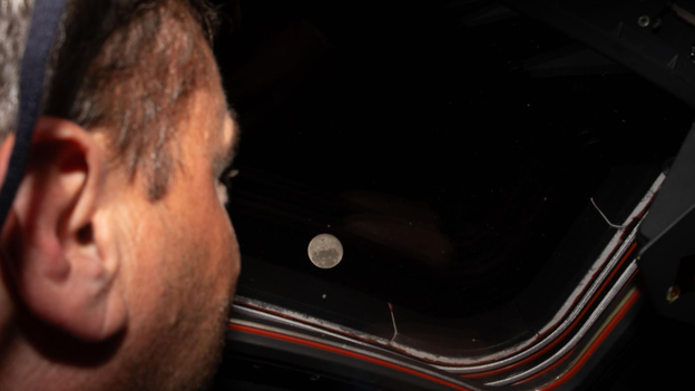 Artemis II Commander Reid Wiseman gazes at the Moon ahead of historic flyby