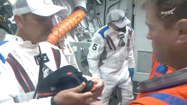 Inside the White Room: Artemis II closeout crew prepares for boarding