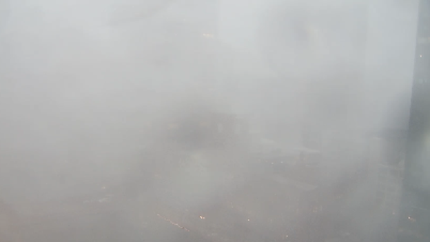 Downtown Chicago skyline disappears as dangerous storms slam the city