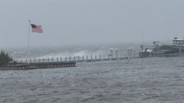 Storm surge spills into back bays near Island Beach State Park