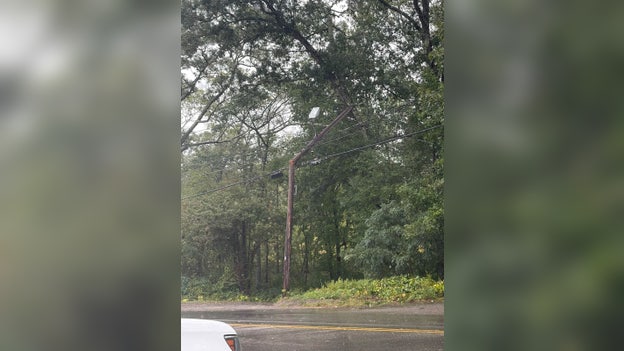 Nor’easter knocks out power to nearly 70,000 in the Northeast as coastal communities battered