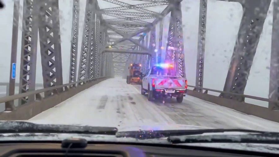 Watch: Crews clear snow from Rainbow Bridge in Beaumont, Texas