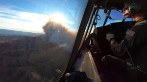 National Guard drop fire retardant on California Hughes Fire