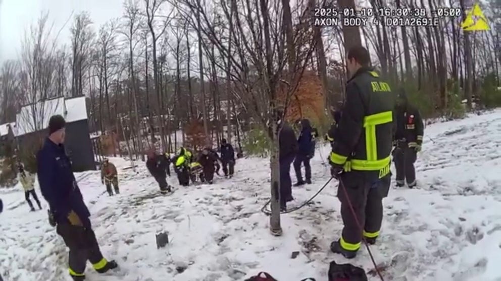 Atlanta Police Department released video of a rescue of a young boy who was injured falling down a steep embankment and became stranded alongside a creek.