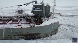 Drone footage shows Canadian freighter trapped by ice on Lake Erie