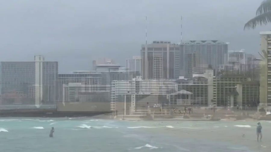 Strong winds churn waves on Kaimana Beach in Honolulu, HI