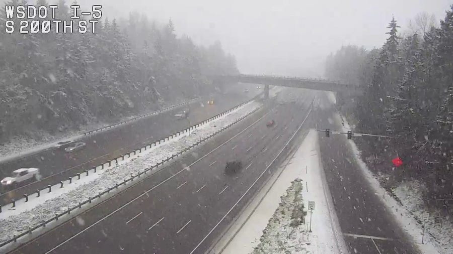 Snow flurries fall in Seatac in Washington on Interstate 5 as Atmospheric River moves through