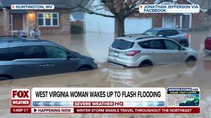 West Virginia woman wakes up to flash flooding