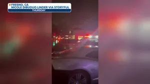 Road flooding in Fresno, California after atmospheric river dumps rounds of rain