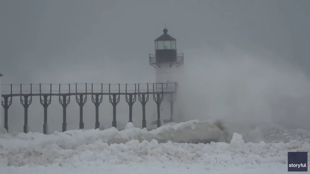 Large chunks of ice formed on the Lake Michigan shoreline as large waves crashed up onto the pie on Sunday in St. Joseph, Michigan. Video shows the ice and strong winds that fueled the waves. 