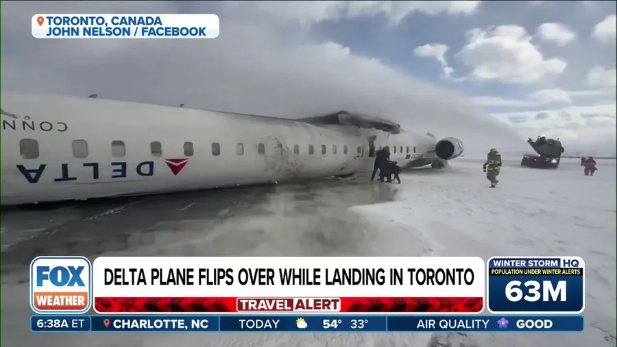 Delta plane flips over while landing in Toronto