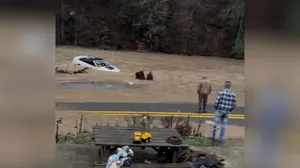 Powerful floods carry Ford Mustang downstream in West Virginia