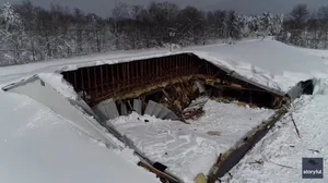 Drone footage shows caved-in roofs after lake-effect snowstorm wreaks havoc in New York