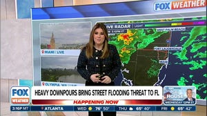 Downpours bring flood threat to Florida Monday