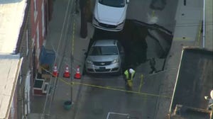 Sinkhole in Philadelphia swallows a vehicle