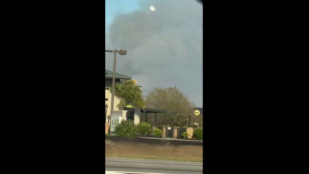 This video shared from South Carolina shows smoke from a wildfire filling the sky as the blaze rages in Carolina Forest on Saturday, March 1, 2025.