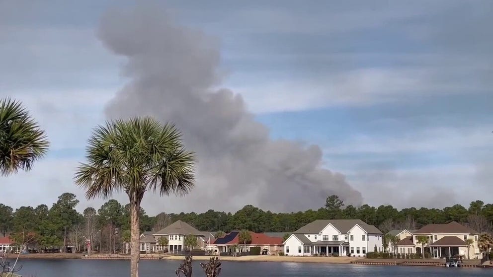 Video from Monday shows heavy gray smoke filling the sky in Myrtle Beach as firefighters continue to fight 1,600-acre wildfire. 