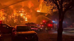 Watch: Massive flames creep up on homes as firefighters battle South Carolina wildfire