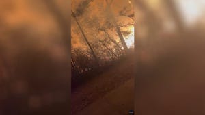 Video shows flames around South Carolina residents fleeing wildfire