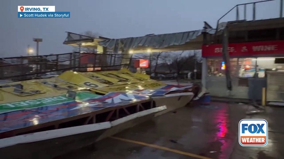 Scott Hudek captured this footage Tuesday morning showing the huge gas sign lying at the entrance to a Raceway station in Irving, Texas.