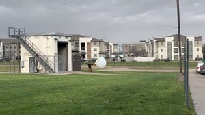 Gusty winds make for a tough weather balloon launch for the National Weather Service in Fort Worth