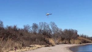 New York City firefighters battle brush fire in Brooklyn