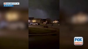 Tornado captured on video as it tracks toward Oakland City, Indiana 