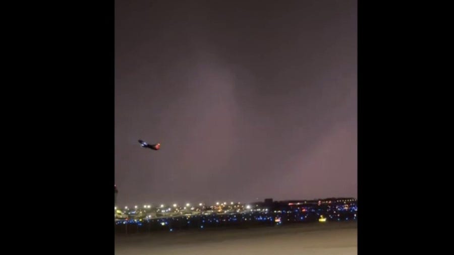 VIDEO: Plane takes off as tornado spins near airport