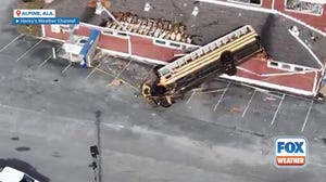 EF-2 tornado flips school bus onto Winterboro, Alabama gym