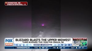 Blizzard blasts Upper Midwest with heavy snow, strong winds