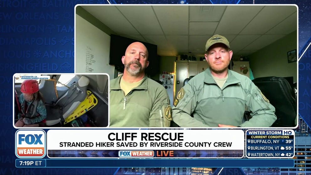 Deputies Jason Beeman and Cory Allen, crew chiefs and rescue specialists with the Riverside County Sheriff's Office Aviation Unit in California, spoke about their daring rescue of a hiker who was stranded on a cliffside and holding on for her life.