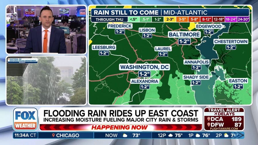Heavy rain riding up East Coast with cities like Washington at risk of flooding