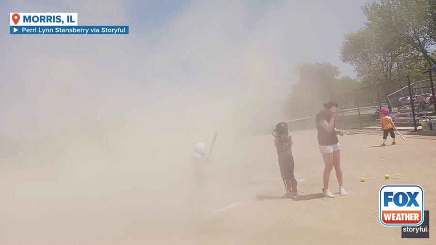 Watch: Dust devil interrupts little league softball game in Illinois