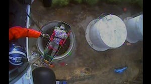 Construction workers rescued after falling 60 feet into empty water tower in western Washington state