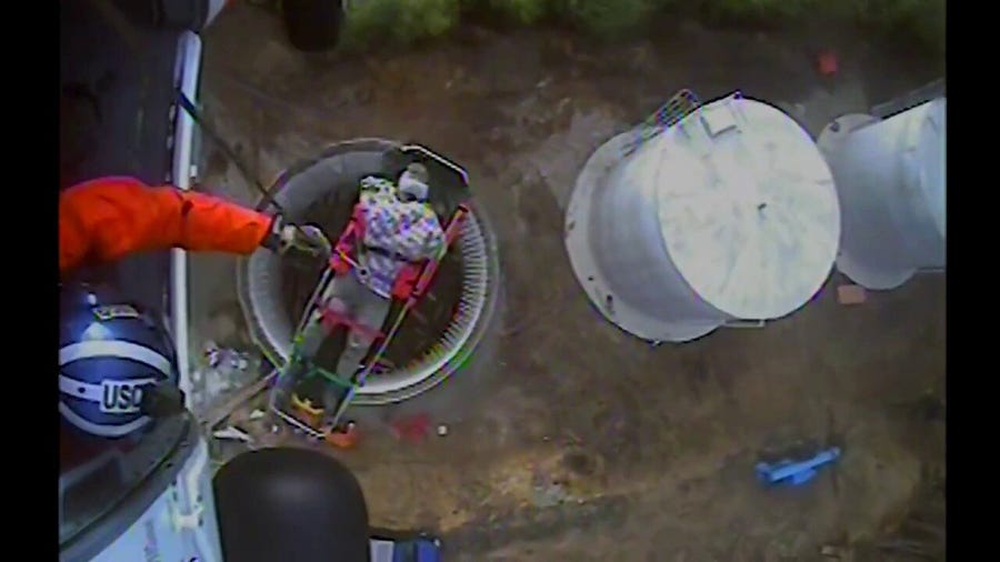 Construction workers rescued after falling 60 feet into empty water tower in western Washington state
