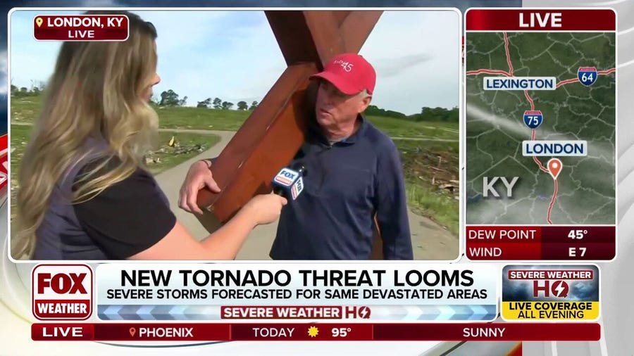 Man with cross walks through Kentucky town decimated by tornado: ‘Complete and total devastation’