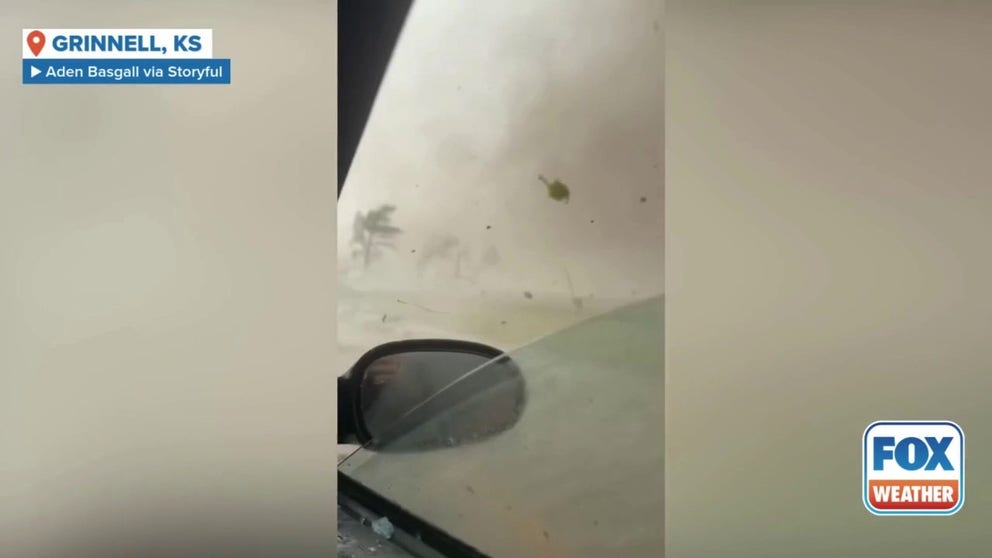 Aden Basgall was inside a car when he became caught in a tornado that struck Grinnell, Kansas, on Sunday.