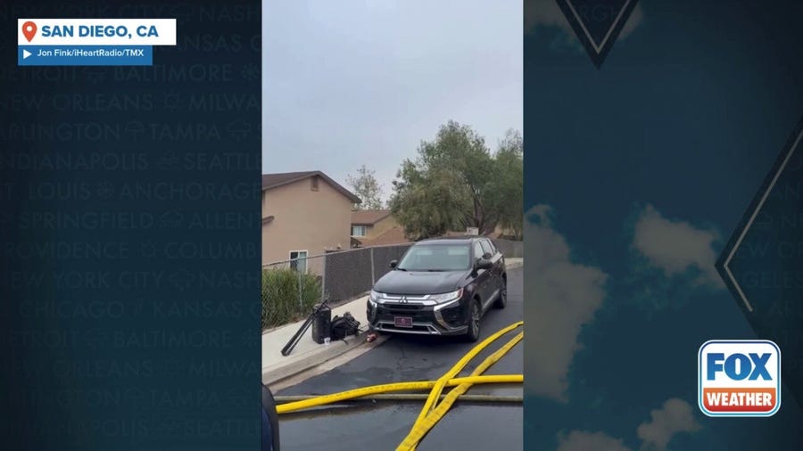 San Diego neighborhood remains under evacuation after 2 killed in plane crash
