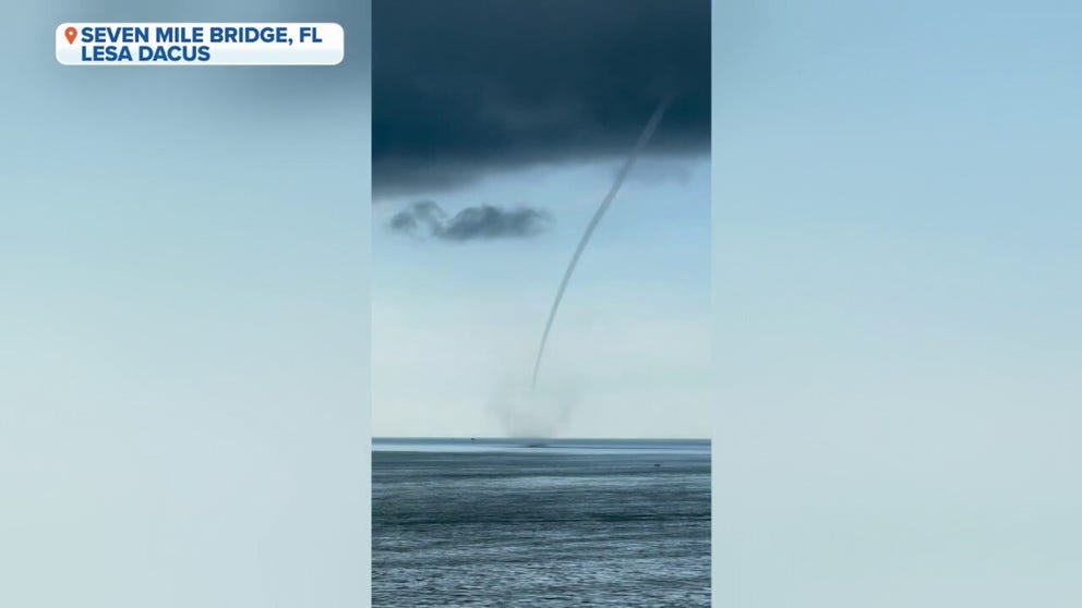 Video from Seven Mile Bridge shows a large waterspout spinning over the ocean in the Florida Keys. 