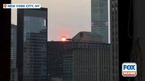 Red sunrise amid wildfire smoke in New York City