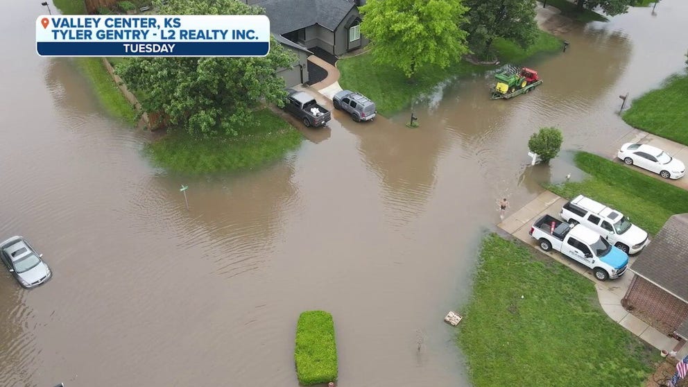 Newly released drone footage lays bare the devastating extent of flash flooding that swallowed homes and roads across south-central Kansas. Some of the heaviest rain swamped the suburb of Valley Center, located about 10 miles north of downtown Wichita.