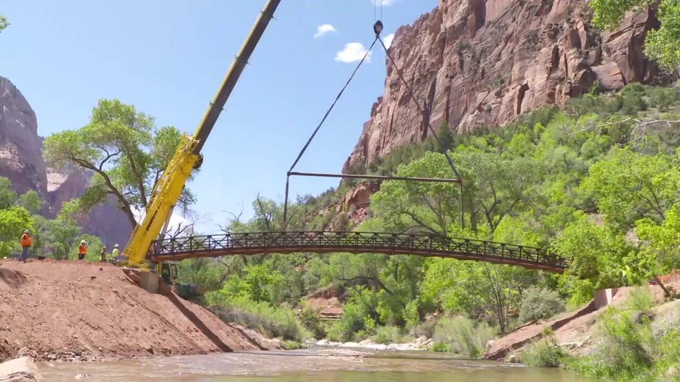A pedestrian bridge connecting a popular trail at Zion National Park to a historic park lodge is once again accessible after a nearby landslide caused it to close for two years.