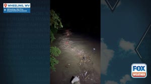 Watch: Floodwaters sweep into Wheeling, West Virginia