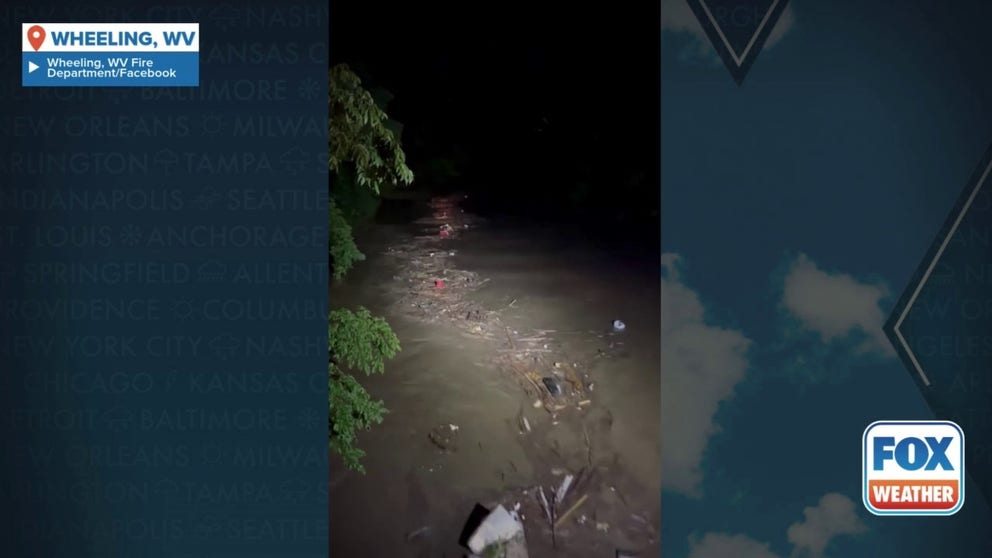 A video shared by the fire department in Wheeling, West Virginia, shows mud and debris in flood waters on Saturday, June 14, 2025.